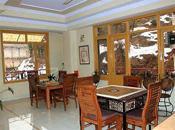 Una Comfort Nandini Hotel ดารัมซาลา ภายนอก รูปภาพ